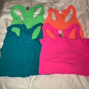 four 344 tank tops !