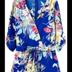 Cute Floral blue romper ties at waist.