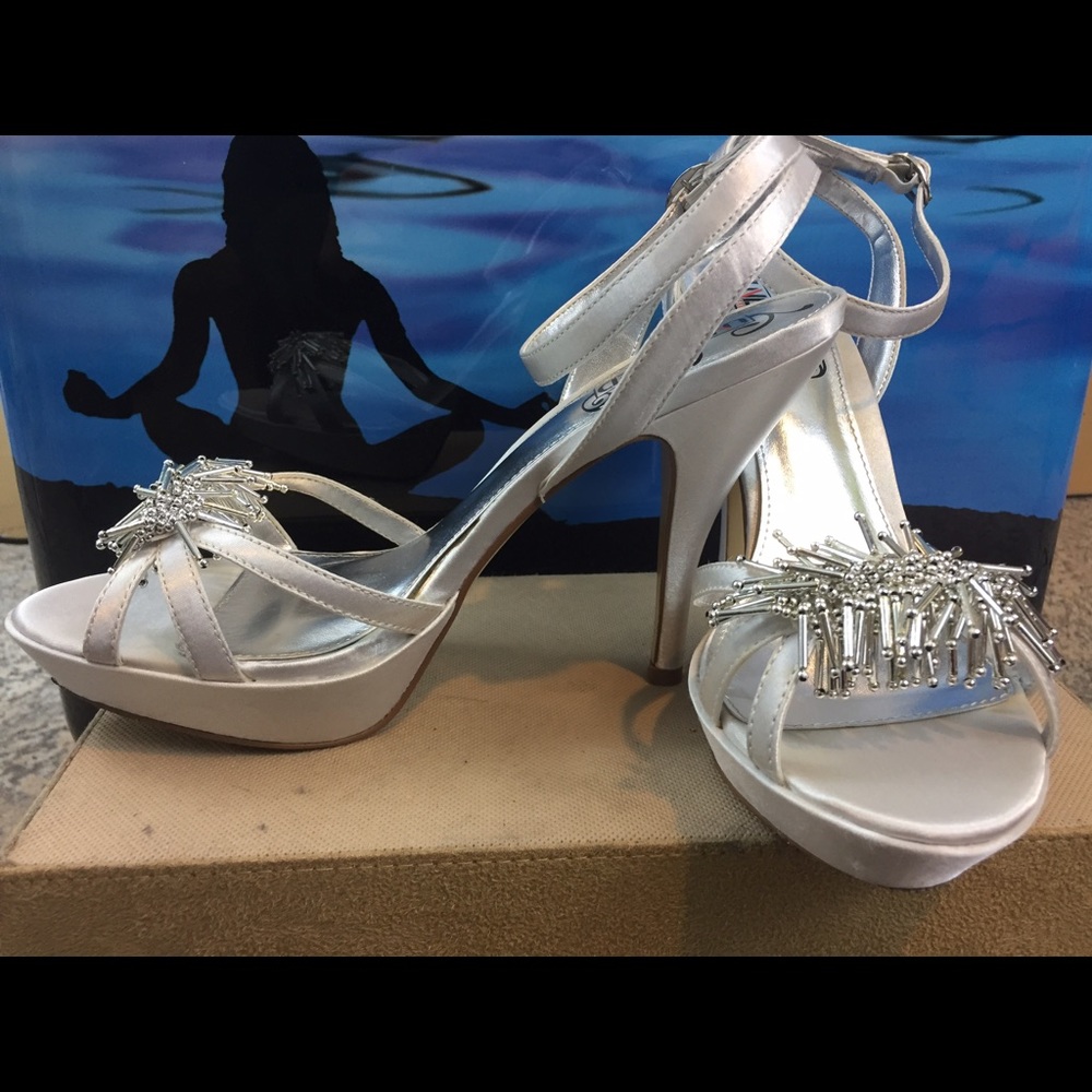 Unlisted by Kenneth Cole silver pumps