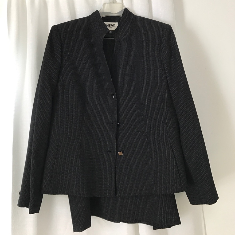 Dress suit set with skirt and blazer.