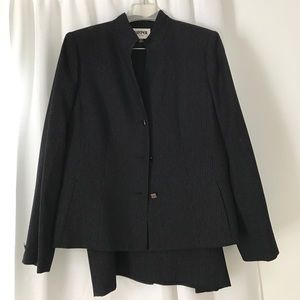 Dress suit set with skirt and blazer.