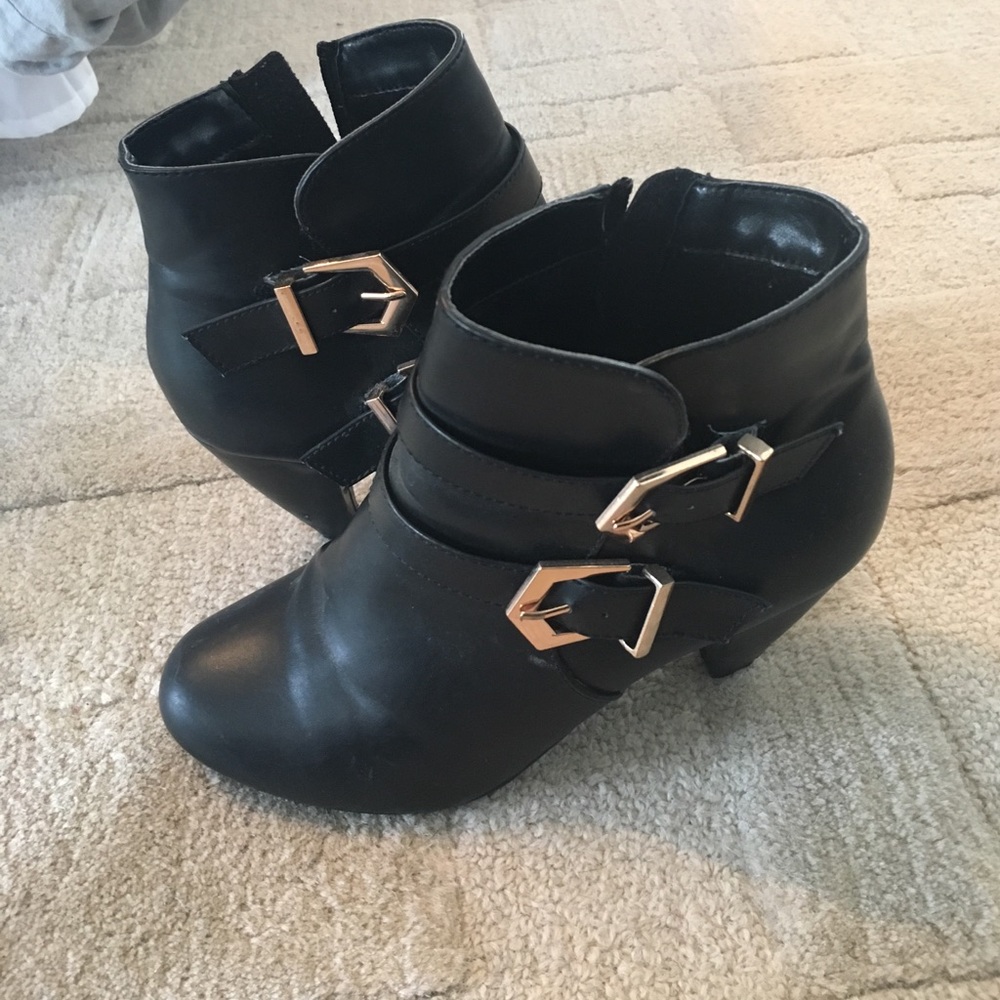 Black heeled booties.