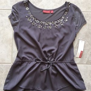 Brand new short sleeve blouse with pretty sequins