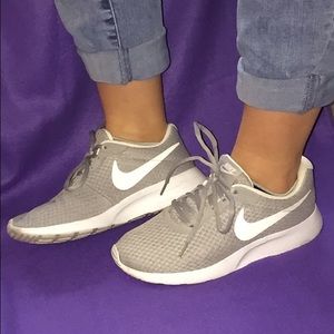 Grey Nike Tanjun shoes