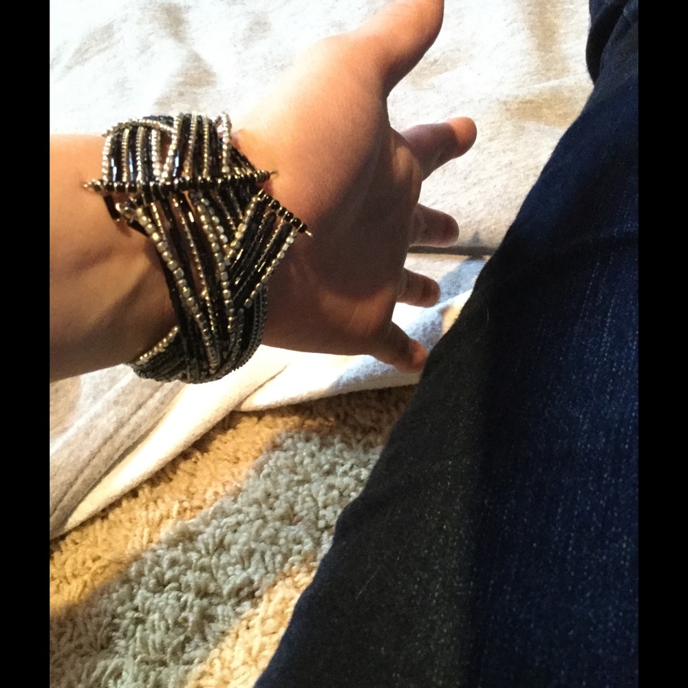 A black and silver beaded  braided wire bracelet