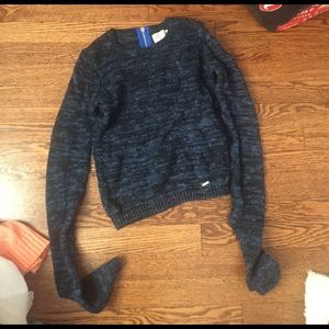 blue and black knitted sweater