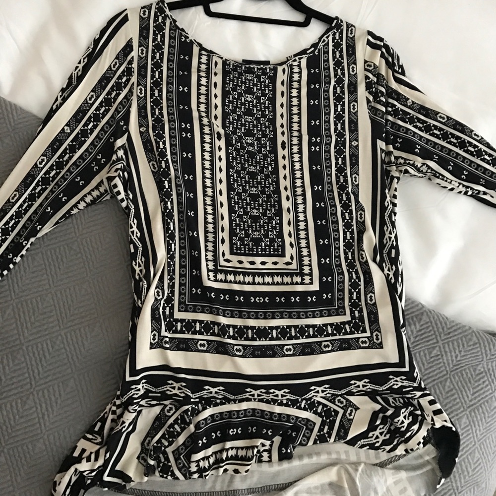 Ultra soft flowy Anthropologie ruffle edge tee