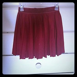 Red pleated skirt
