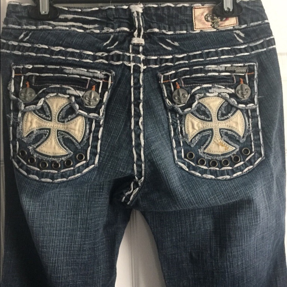 Laguna Beach Jeans, size 28 with white stitching.