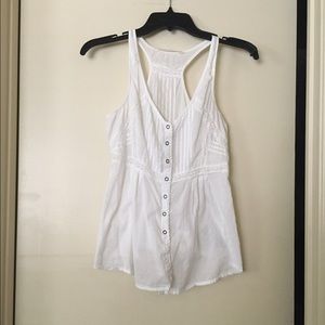 White sleeveless button down