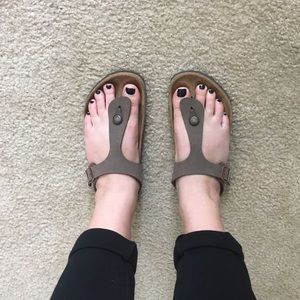 Tan/nude Birkenstock thing sandals.