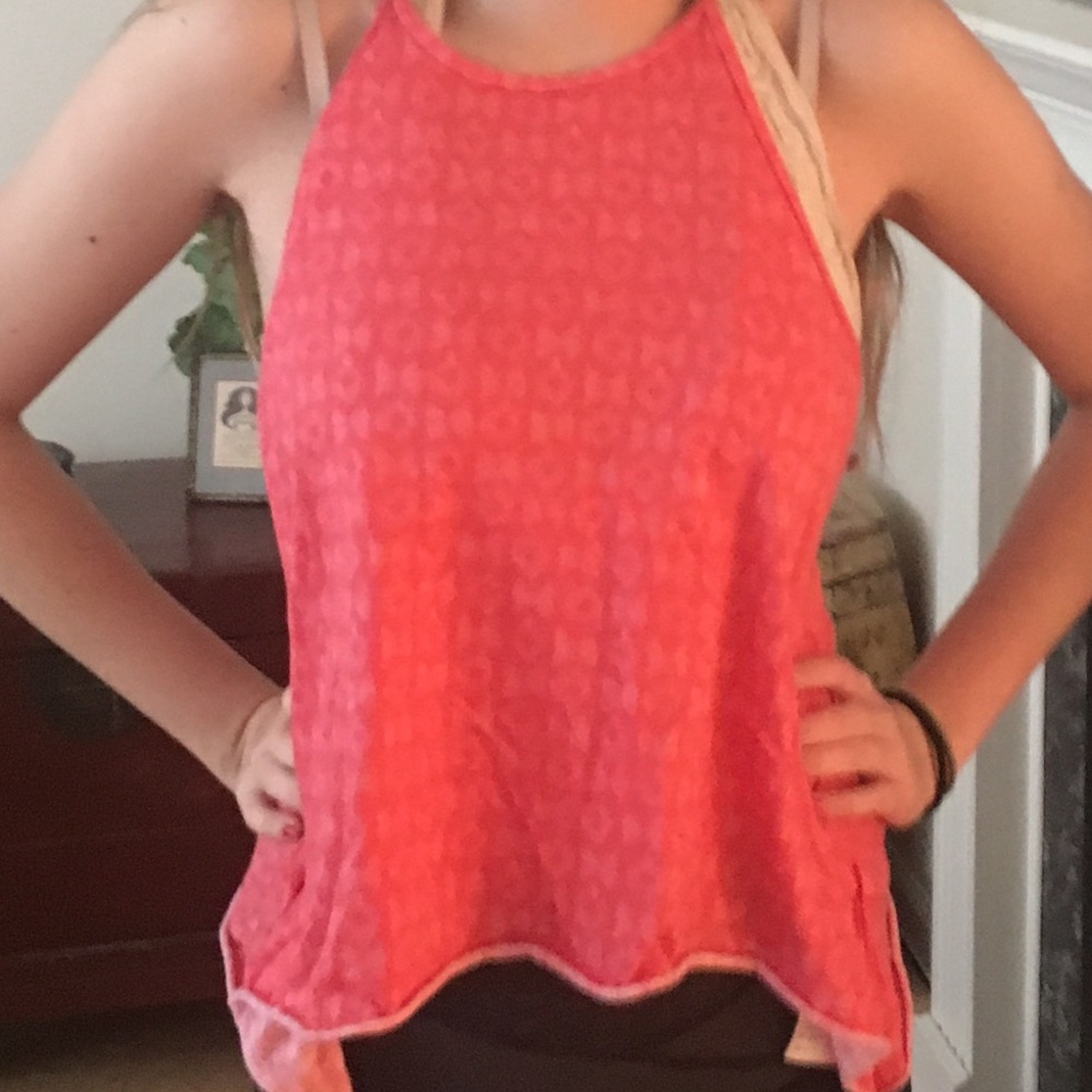 Pink halter with an Aztec pattern.