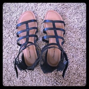 Black strap sandals with zipper in the back