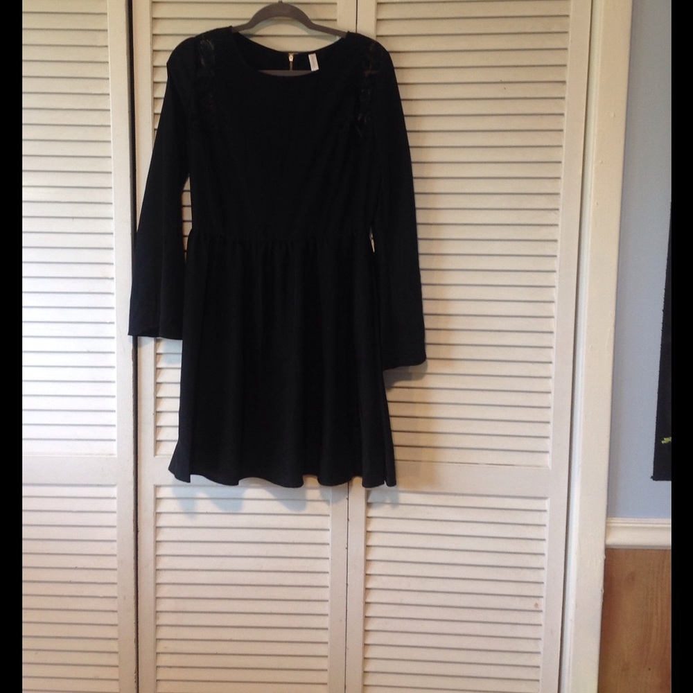 Black dress with lace detail on top sleeves