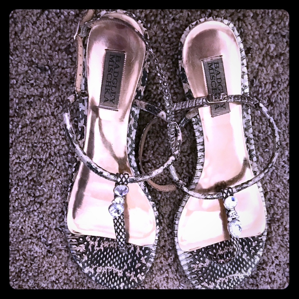 Snake print sandals with gold feet print