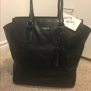 Large all Black leather tote in GUC.