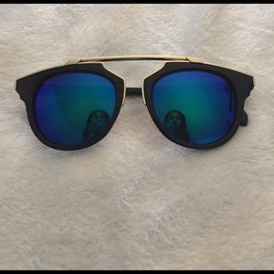Black and Gold sunglasses with blue/green