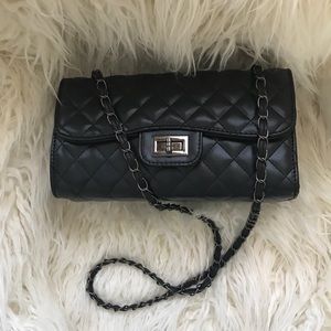 Black quilted cross body or shoulder handbag