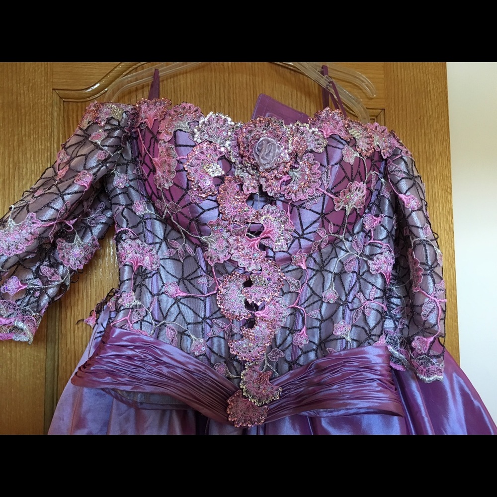 Purple custom made gown with sleeves