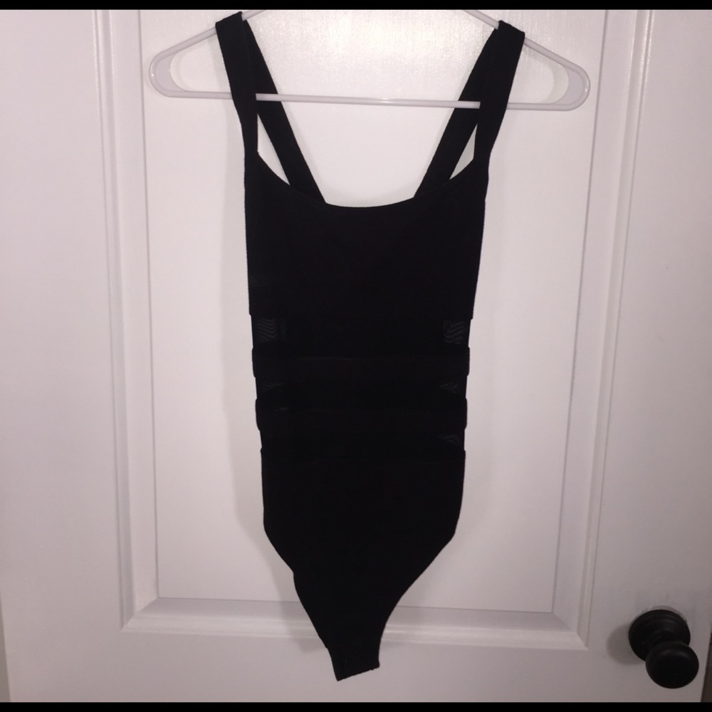 Black mesh criss cross body suit