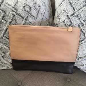 Beige and black soft faux leather pouch