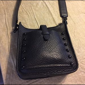 Rebecca Minkoff cross body. Small feed bag style.