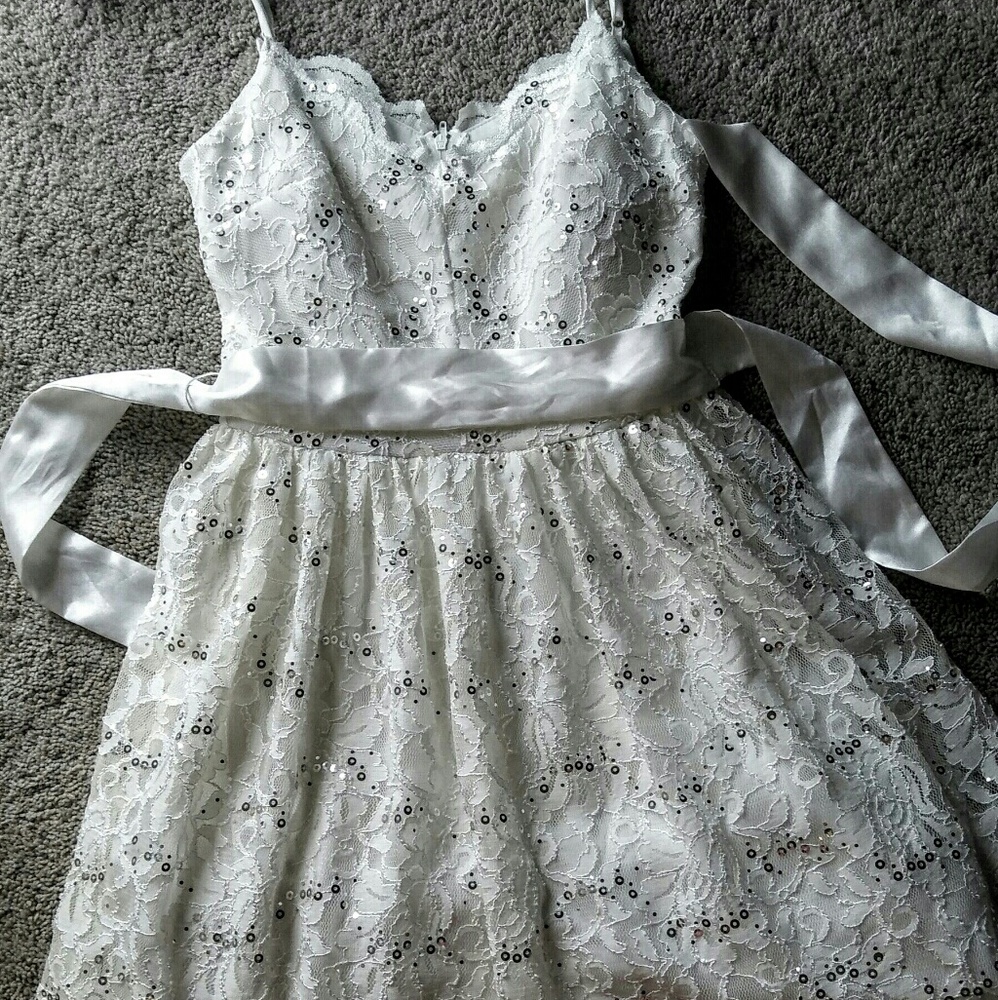 Size 3 white lacey dress.