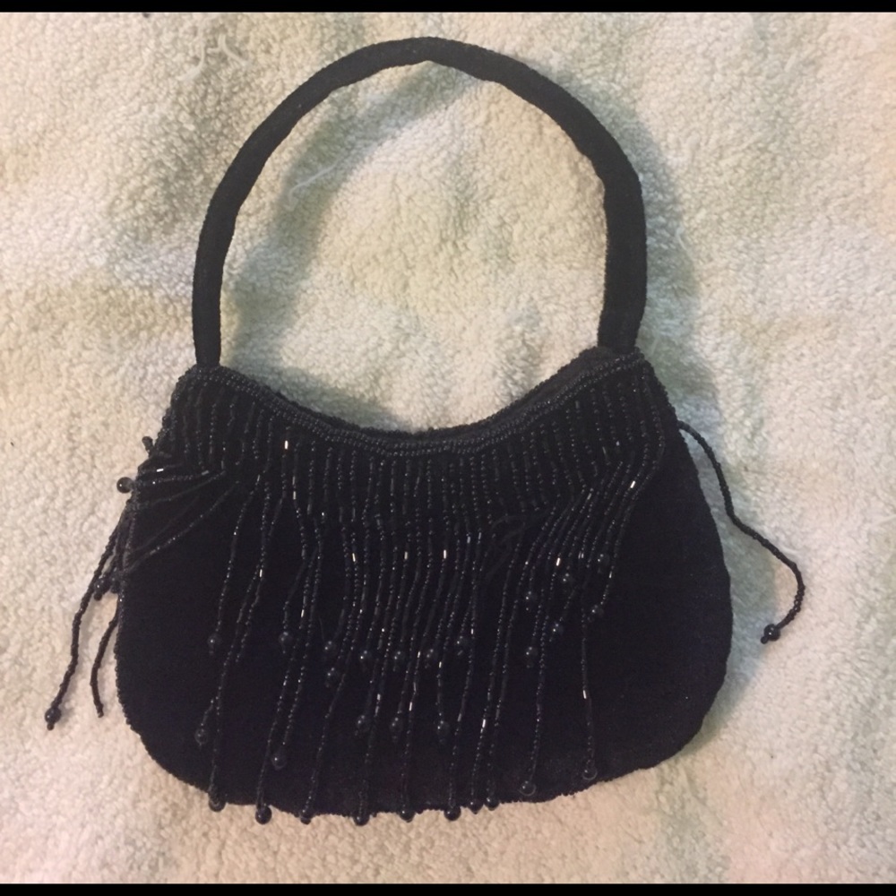 Little Black Bag with sparkle tassels