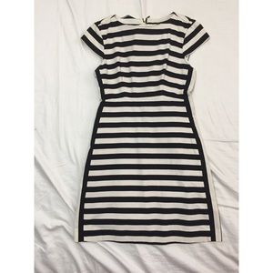 Fitted black/white stripped dress.