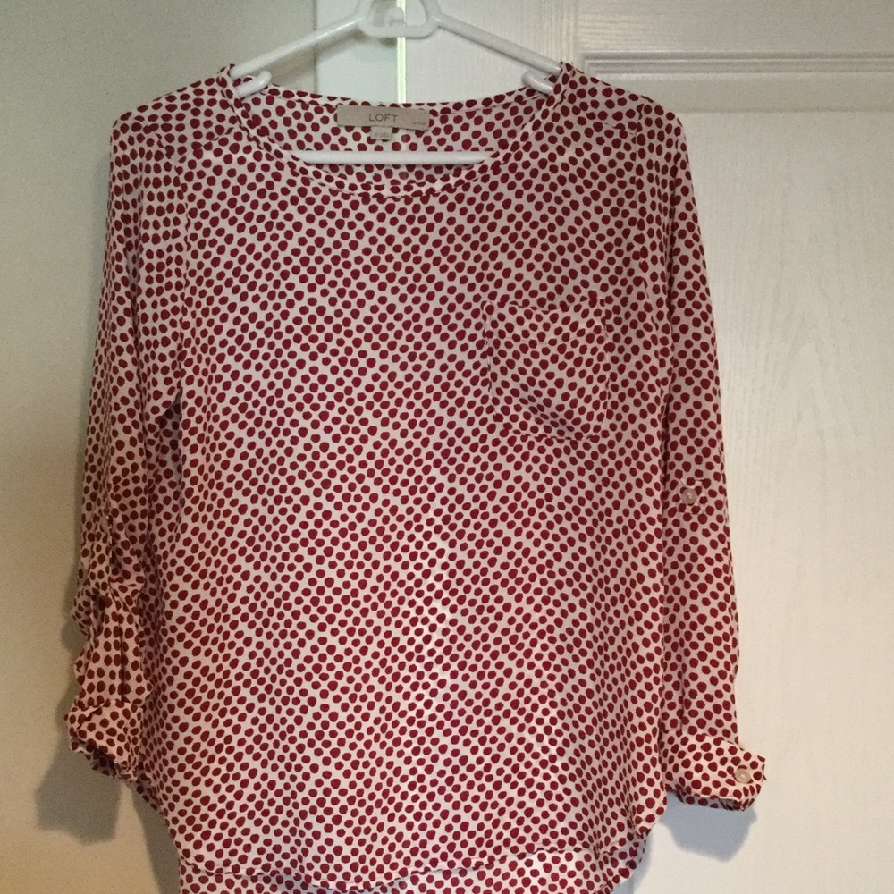 Red polka-dot blouse
