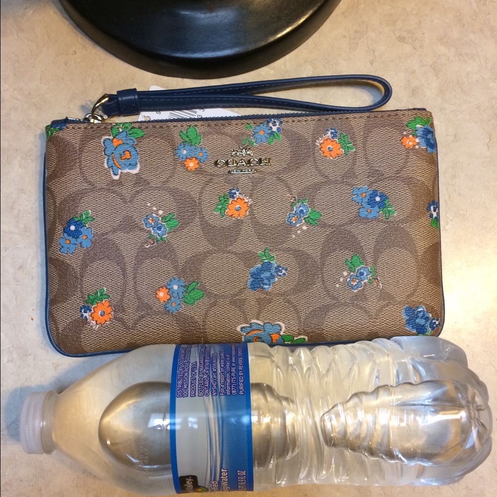 SOLD LOCAL.     Coach Large Signature PVC