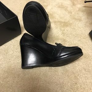 Super cute and classy black KC wedges!