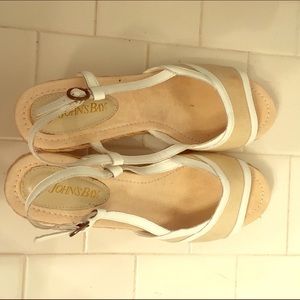 White and beige sling back peep toe wedges.