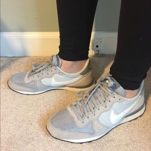 Woman's Nike Internationalist sneakers.
