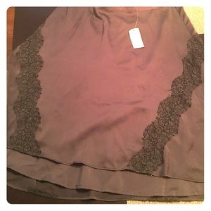 Grey silk skirt. Lace trim on the side