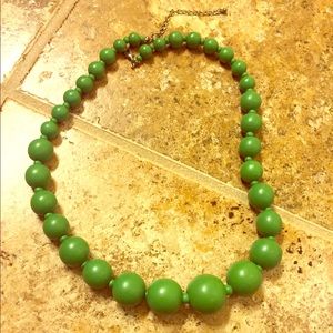 Green wooden bead necklace