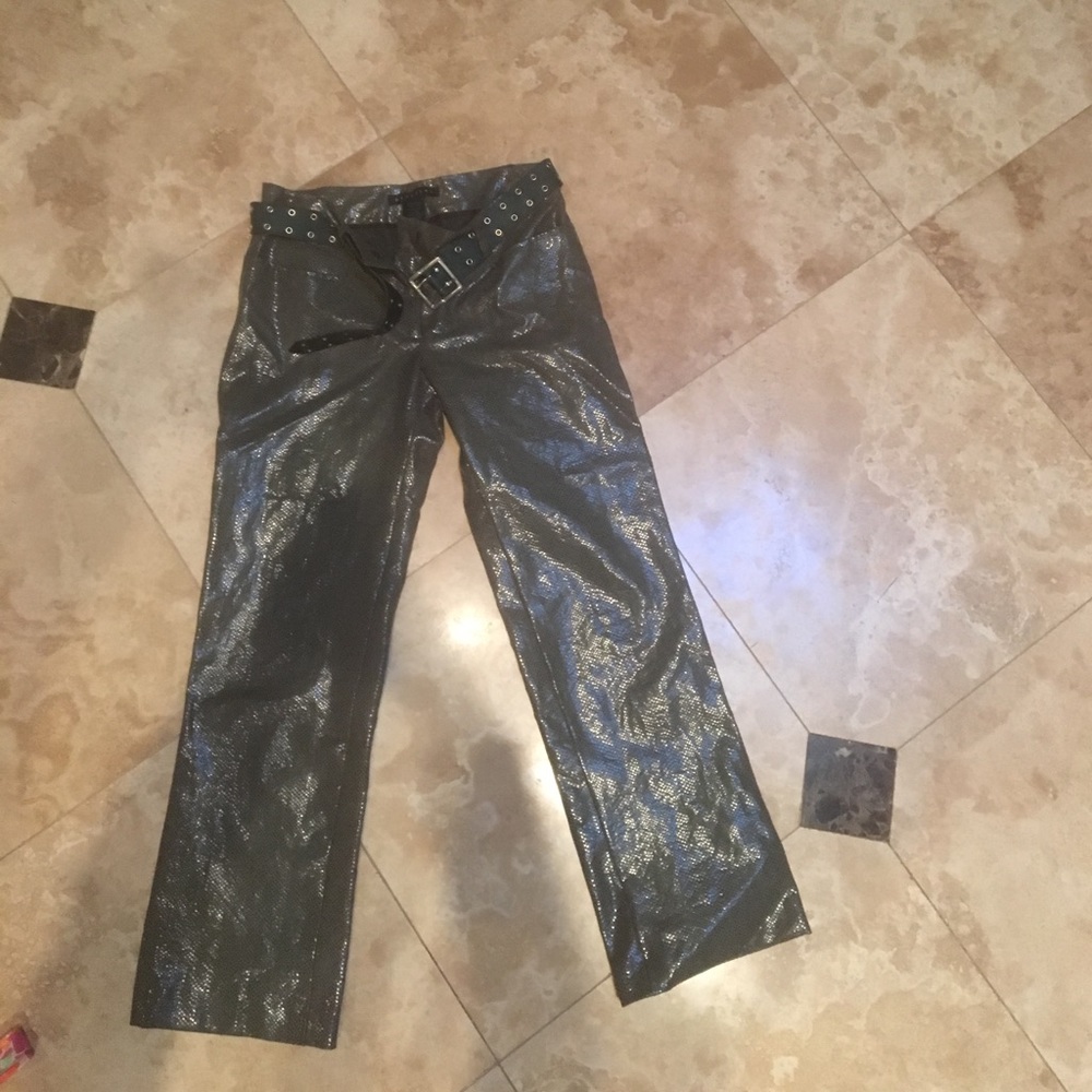 Parallel shiny green pants with belt