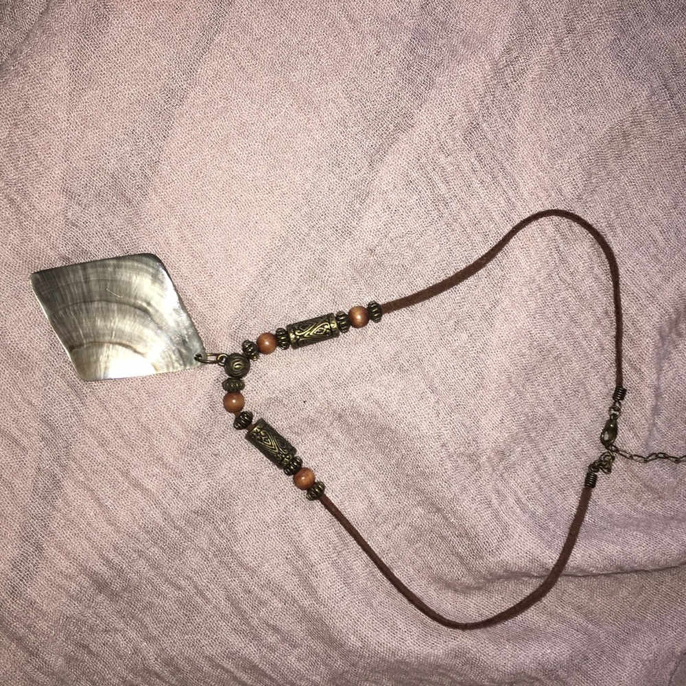 Ladies brown leather choker with shell Medallion