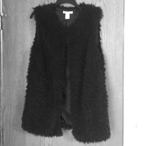 Faux fur vest.  Never worn.