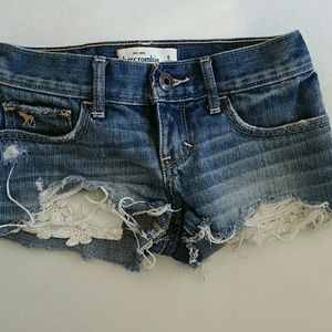 Abercrombie & Fitch cut off jean shorts with flora
