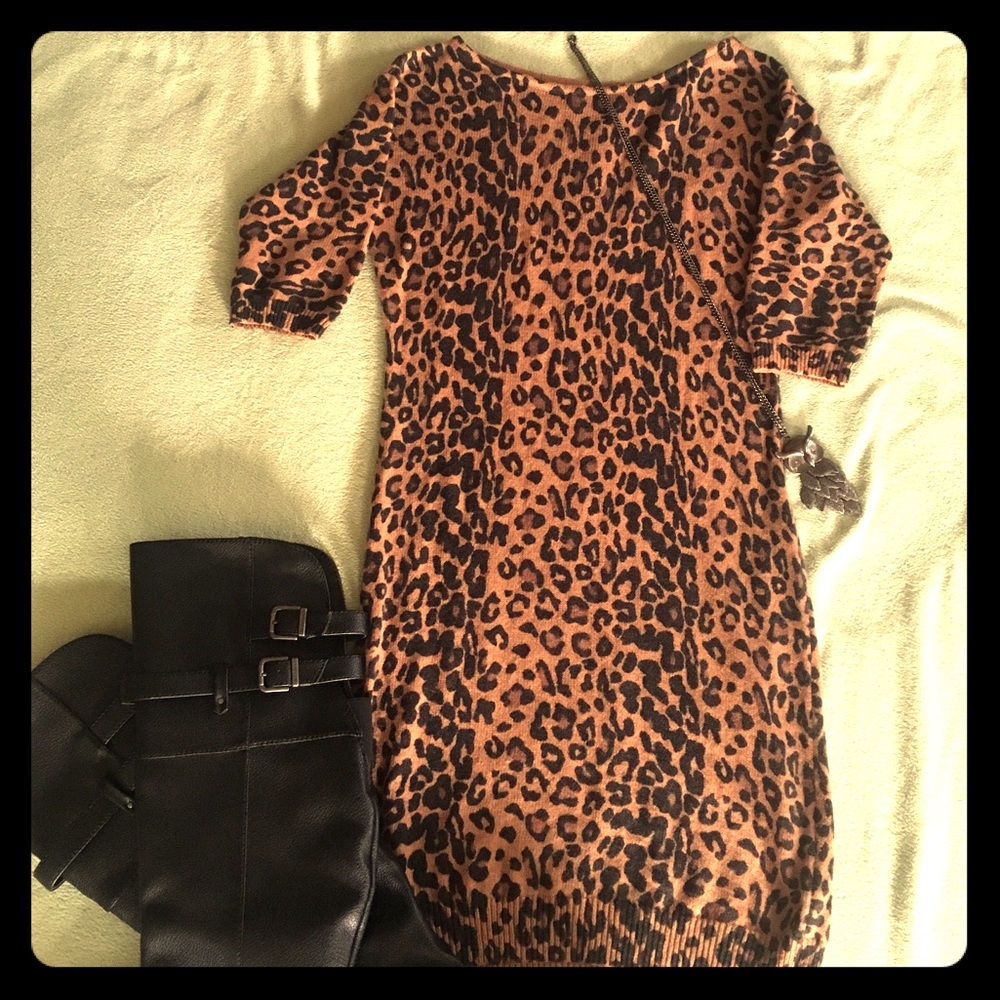 Leopard print sweater dress with short sleeves.