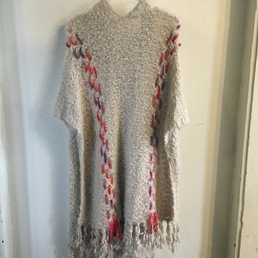 Cream poncho from altered state