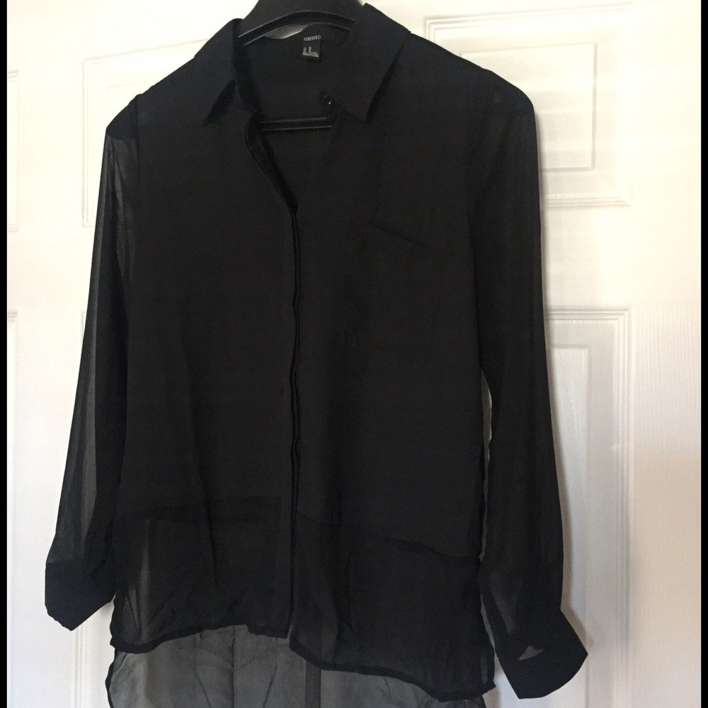 Black semi transparent blouse. Never worn.