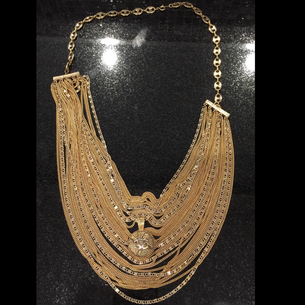 Necklace with CHANEL Button and Chains in gold