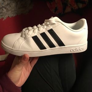 Black and white adidas shoes