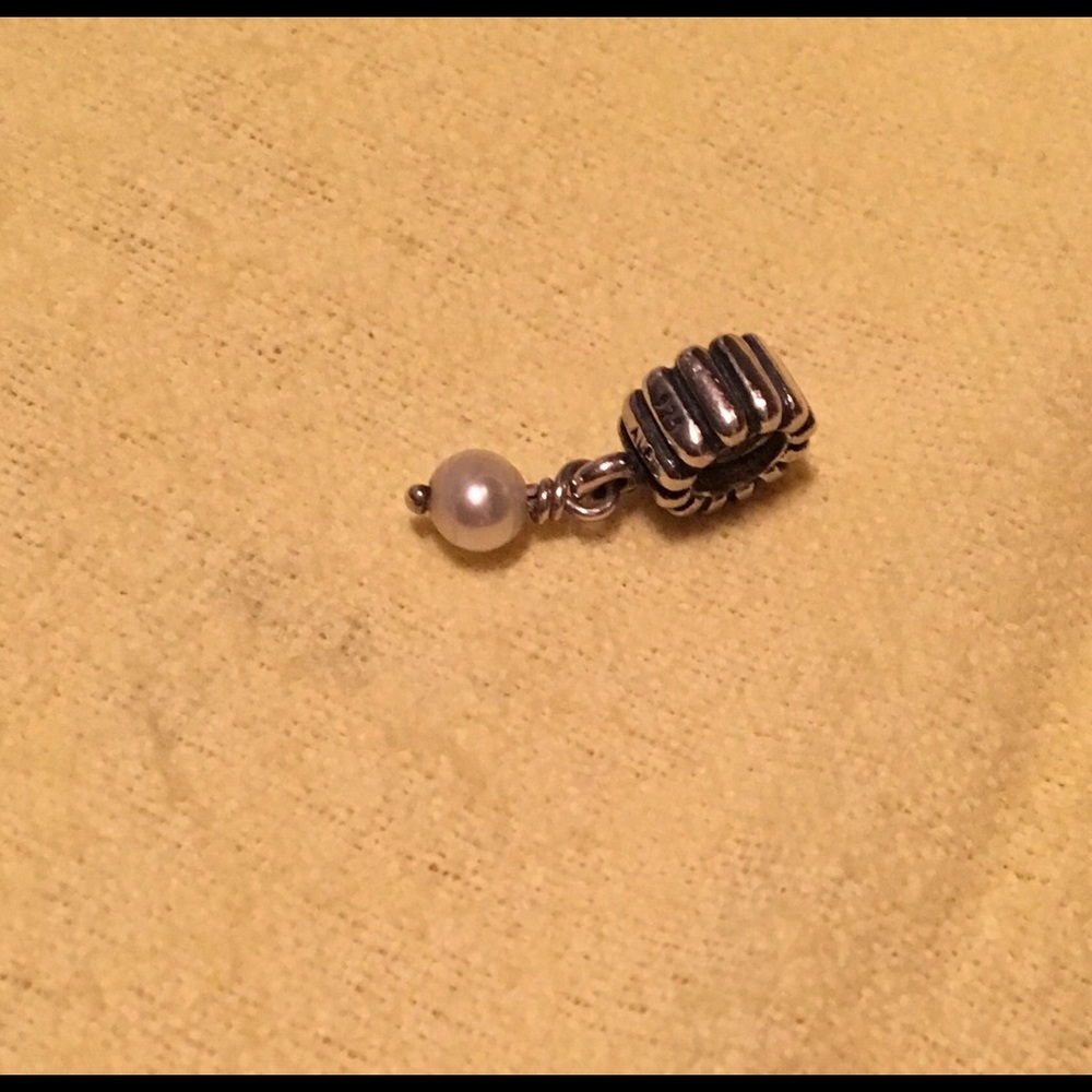 Retired Pearl Charm