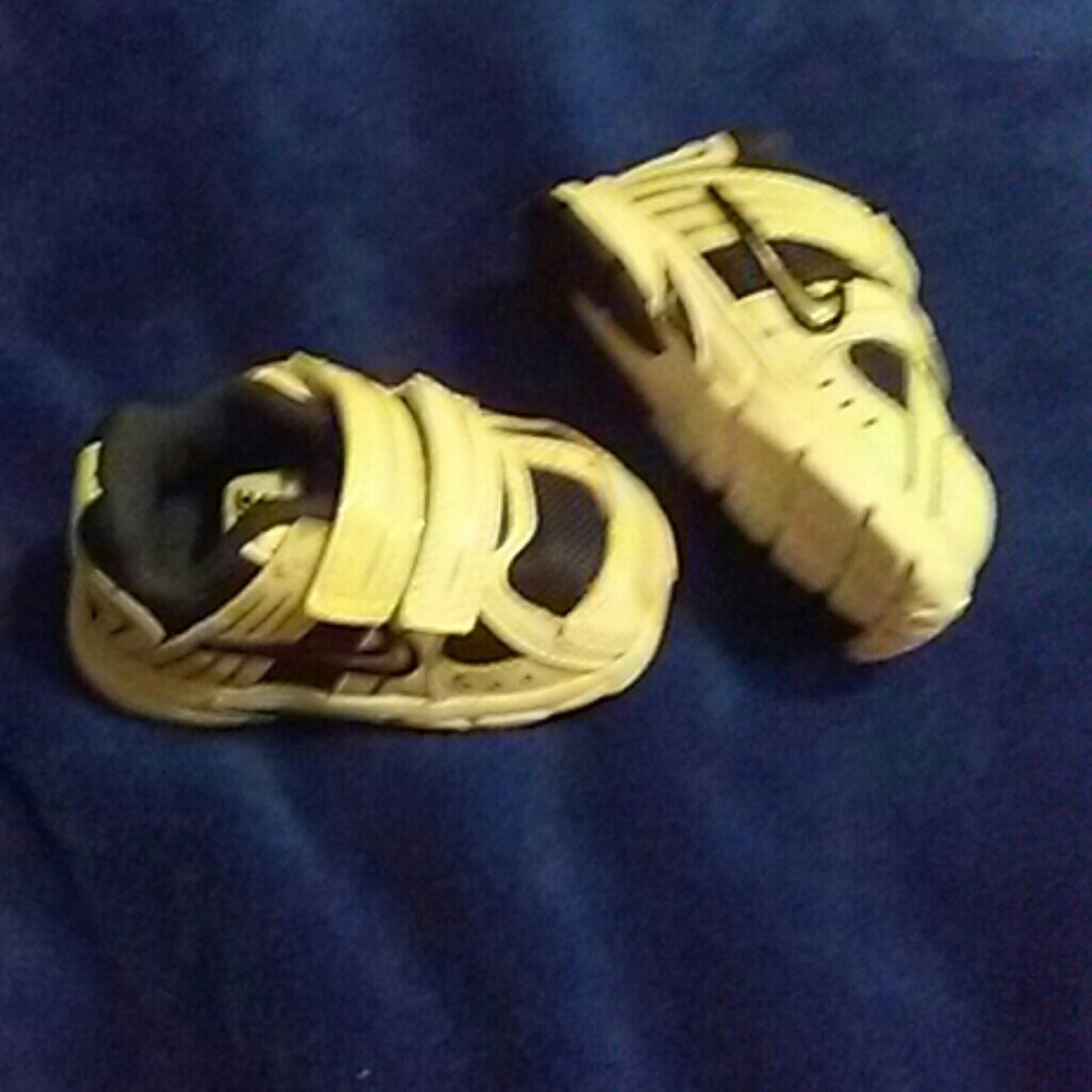 Never worn baby Nike size 2c