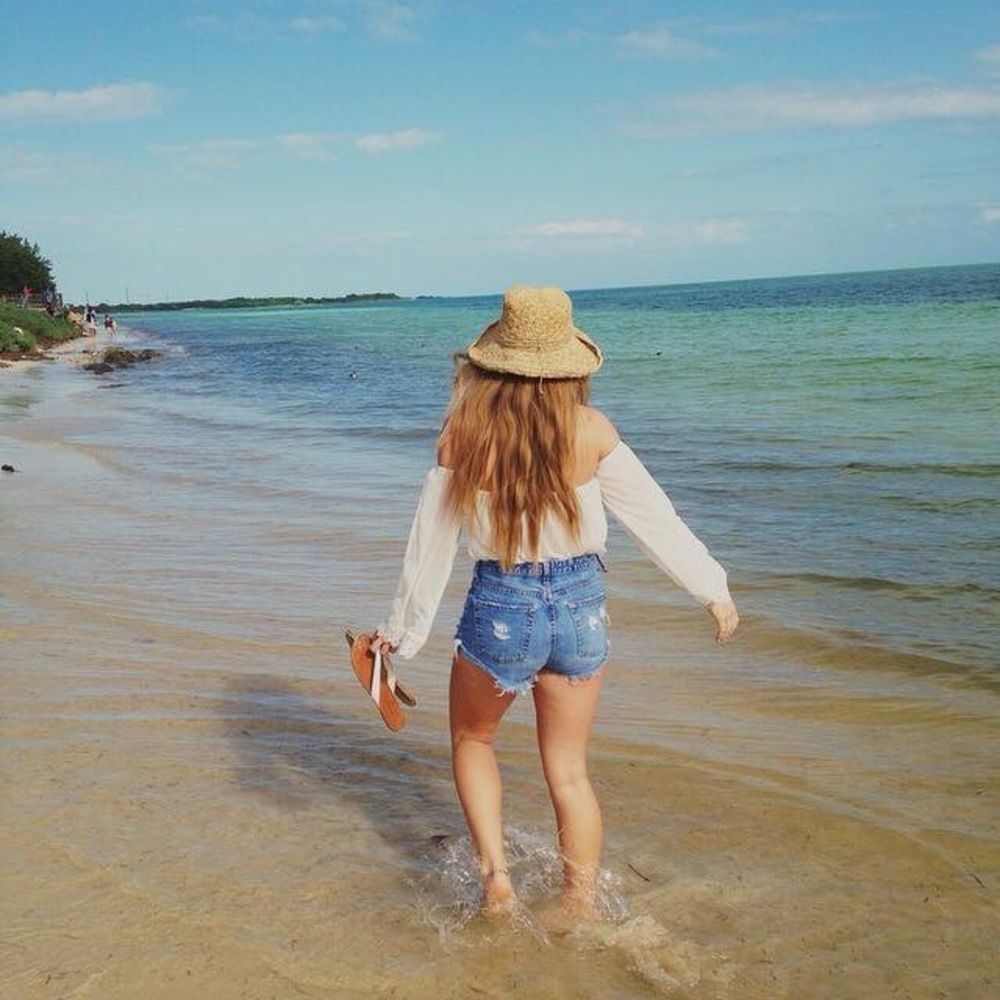 Sheer off-white, off-shoulder top