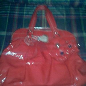 ?oach  poppy bag it's real in great condition