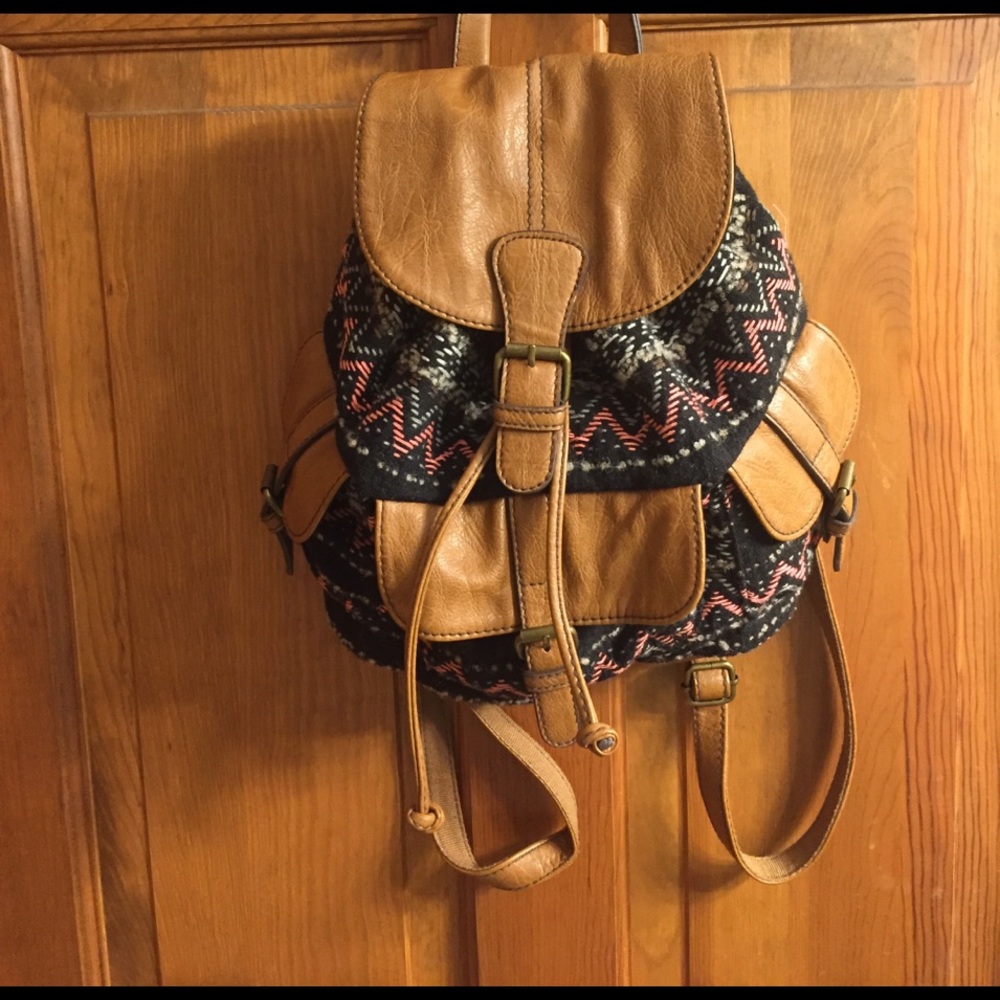 Small black backpack with chevron embroidery